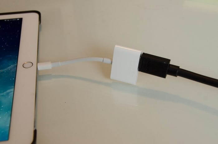 connect iPhone to a charging adapter